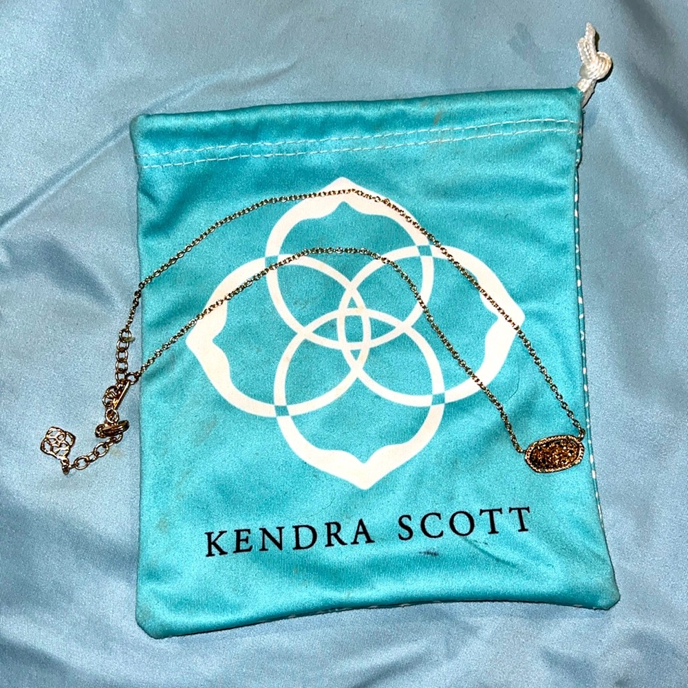 9 Kendra Scott necklaces.